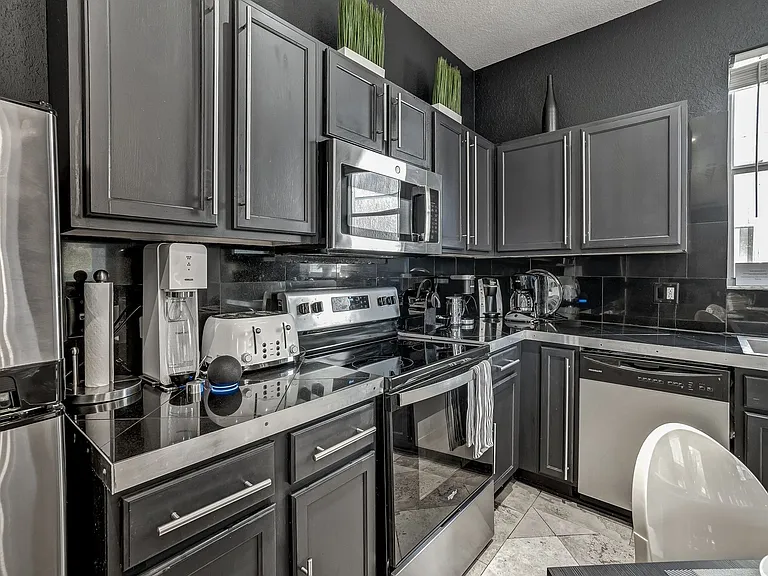 Enjoy modern kitchen fully equipped with state-of-the-art appliances for your culinary adventures.