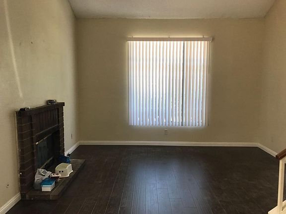 Living room with high ceiling, new floor