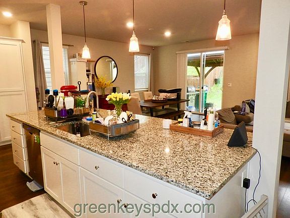 Large granite island with sink in the middle