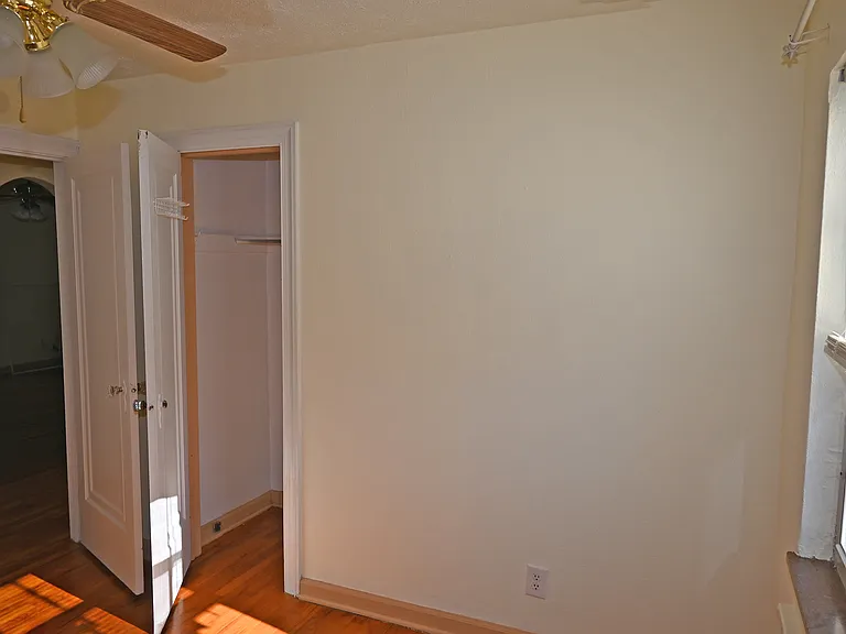 Bedroom nearest bath. Pic showing closet near hallway with two more closets