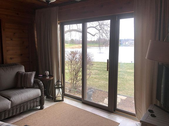 Porch...walkout to community grassy area and Stark Lake
