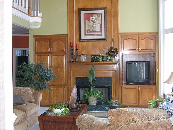 Beautiful maple cabinets in family/living area looking from kitchen