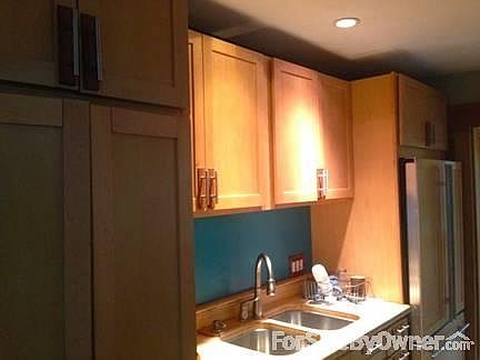 Custom Touches
						:
						Wood faced cabinets are suited with the refrigerator.
