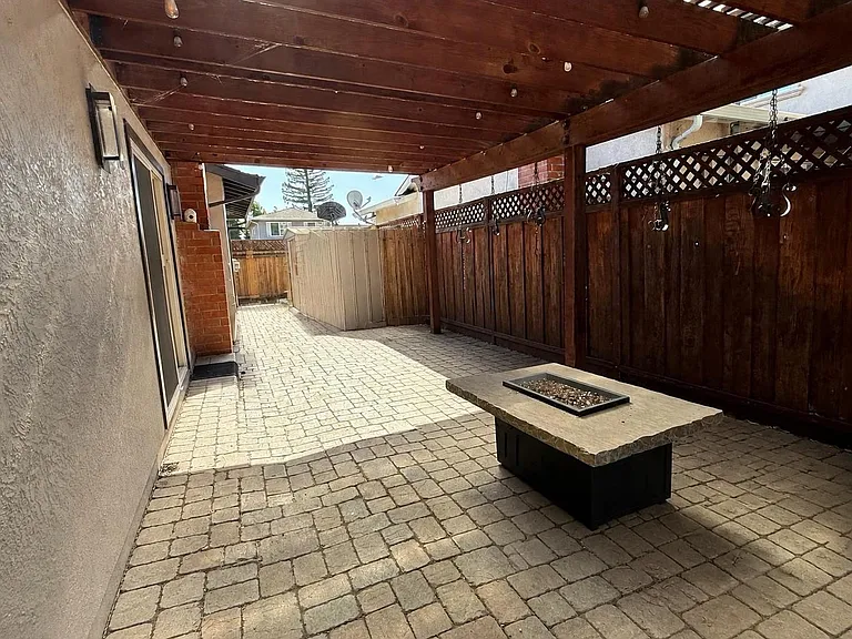 Side yard, firepit, lighting shed