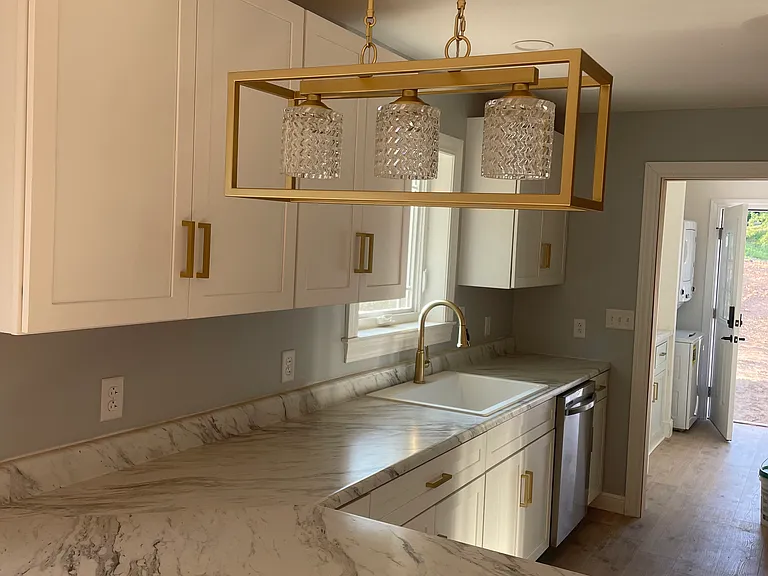 Kitchen bar view to pantry/laundry area.