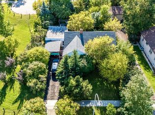 309 NE Sharon Ave SW, Calgary, AB T3C 2G8