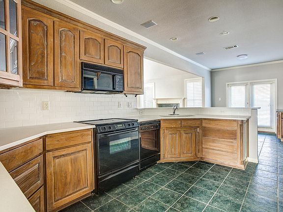 5th image of 6608 Shelton Home Ct