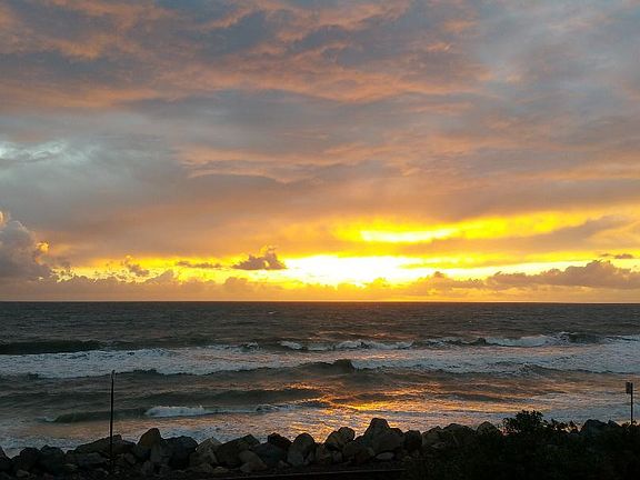 Enjoy Sunset Views from Inside and Outside of the Home