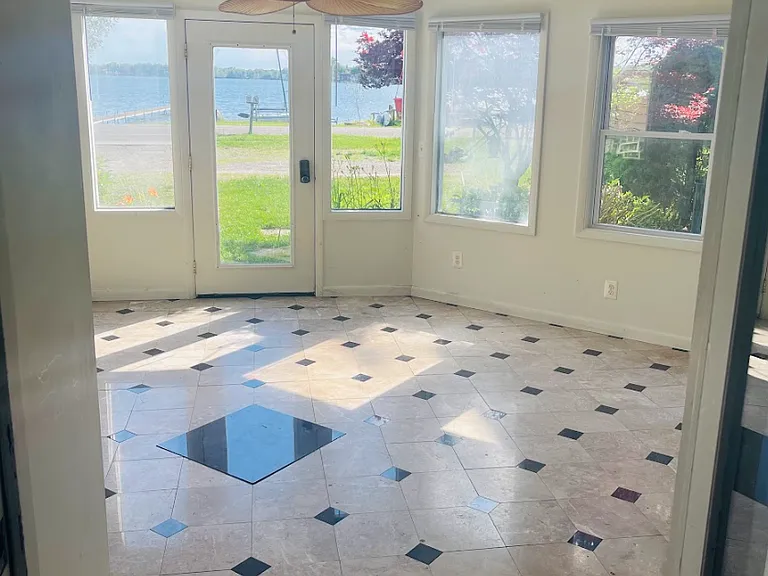 Huge 4-Seasons Room with windows that open, a fan, and heat so you can enjoy all year