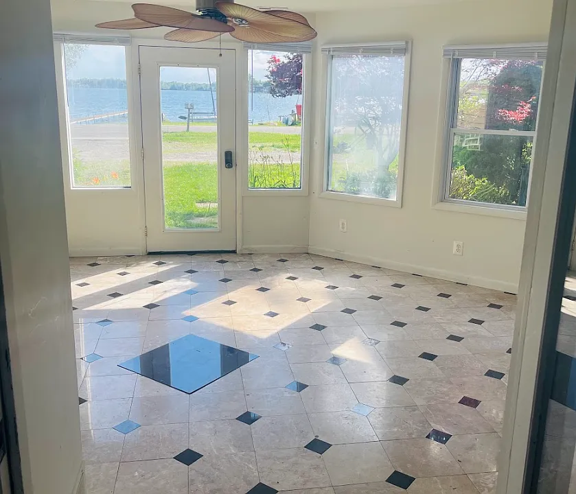 Huge 4-Seasons Room with windows that open, a fan, and heat so you can enjoy all year