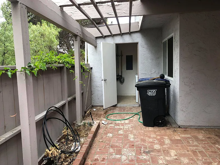 Laundry room in backyard patio