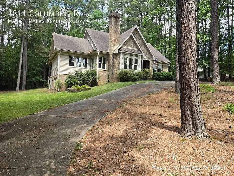 Elegant Brick Home with Basement, Lake Views & Wooded Privacy in Carbonton Heights Sanford, NC — Photo 2