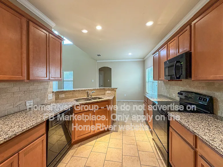 9201 Remington Dr — Photo 3