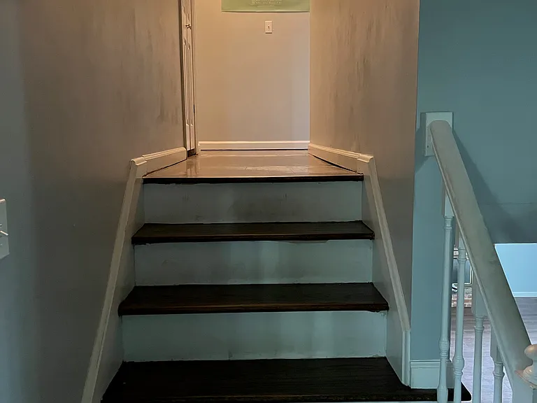 Hallway stairs up to bedrooms