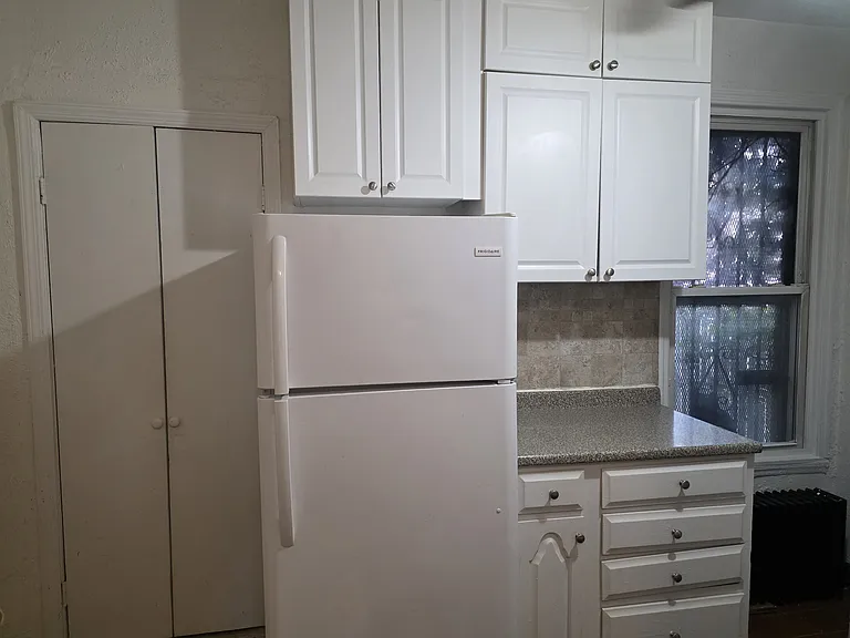 Kitchen doors go to private laudry room.
