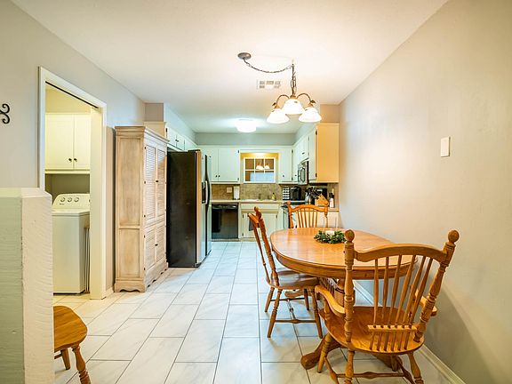 Kitchen, dining and laundry area