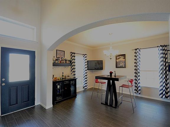 On the left after entry room could be formal dining or whatever you want!!