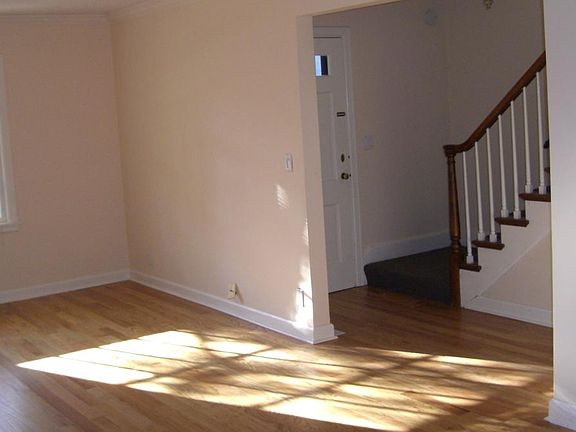 LIVING ROOM LOOKING TO FOYER