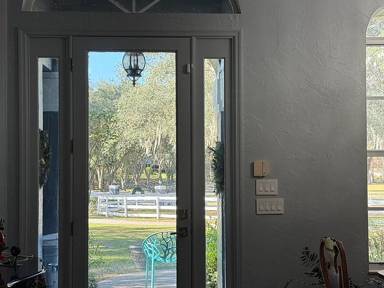 Front Door with Lutron lights throughout. Outdoor light all have daylight bulbs