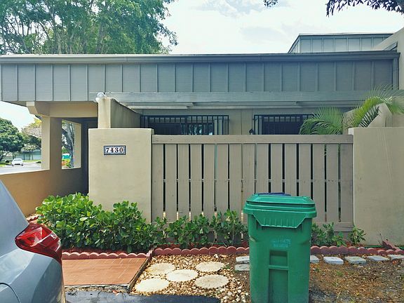 Front w/Secure Fenced Patio 