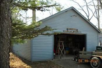 Look at the space in this 112 car attached garage.