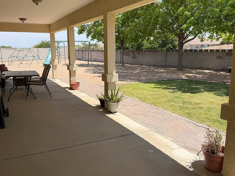 Fully fenced backyard with plenty of room to relax, play or entertain.