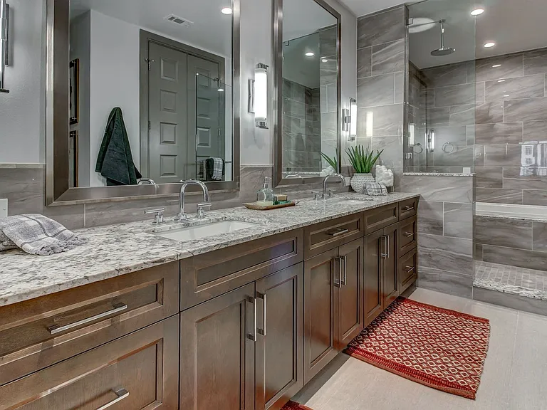 Crafted Tubs with with Tiled Fronts and Walk-in Showers and Built-In Showers with Bench in Select Apartment Homes