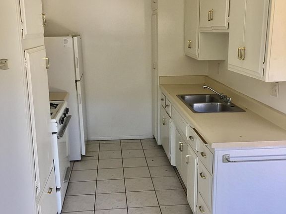 Kitchen with plenty of storage as seen from dining area