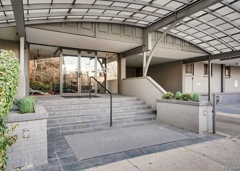 Beautiful and secure building entrance, with call box and camera security.