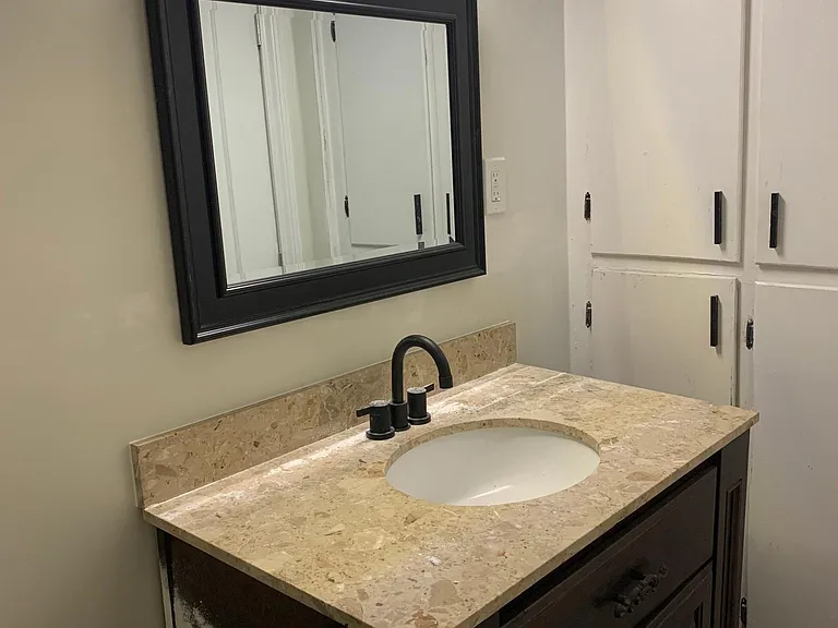 Contemporary bath with lots of cabinets