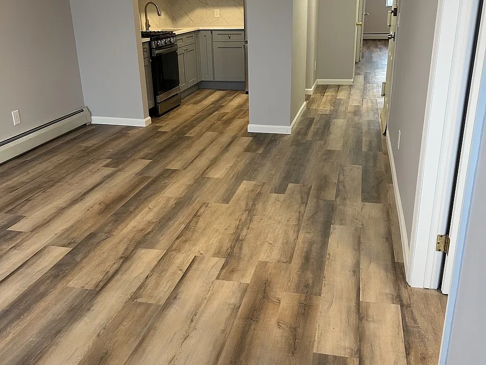 Living Room and Dinning Room with remodeled engineering hardwood floor.