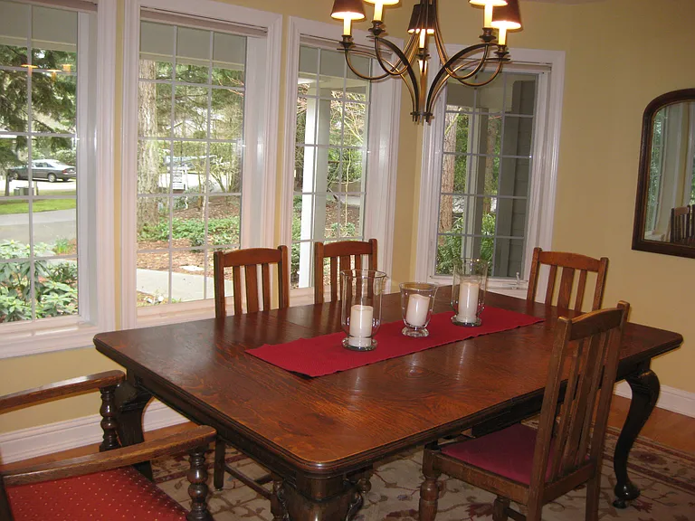 Dining room/flex space. This table has 2 extra leaves and expanded it still fits in the room. There is space for dining hutch and cabinet,