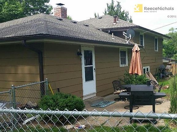 Large, fenced back yard with patio and firepit