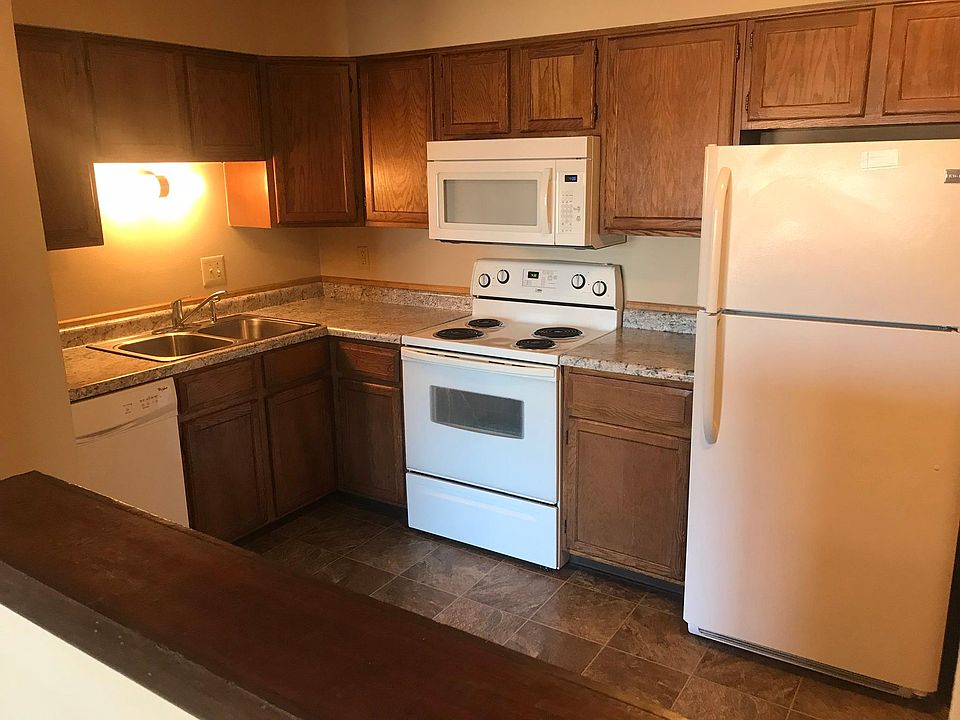 Brand-new countertops! Kitchen includes dishwasher, disposal, electric range, brand-new microwave and refrigerator