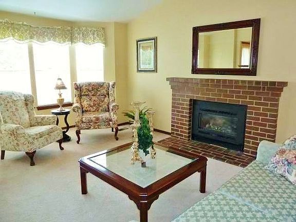 There is a gas insert in the brick fireplace, plus a gas furnace and gas hot water tank.