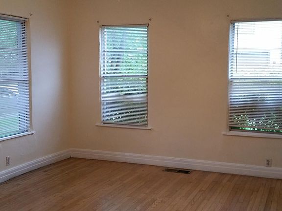 Bedroom with hardwoods and ceiling fan