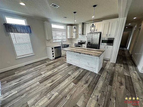 4th image of 34652 Blue Starling St