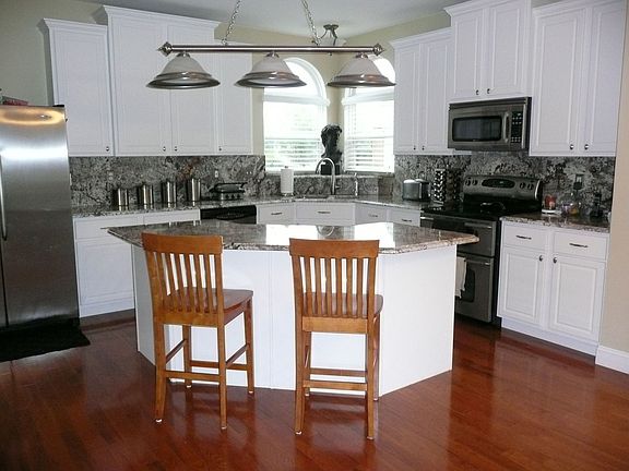 Gourmet Kitchen w/ Exotic Granite, Full Backsplash, & Double Convection Oven 