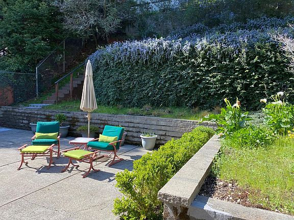Large, sunny patio perfect for planter box gardeners.