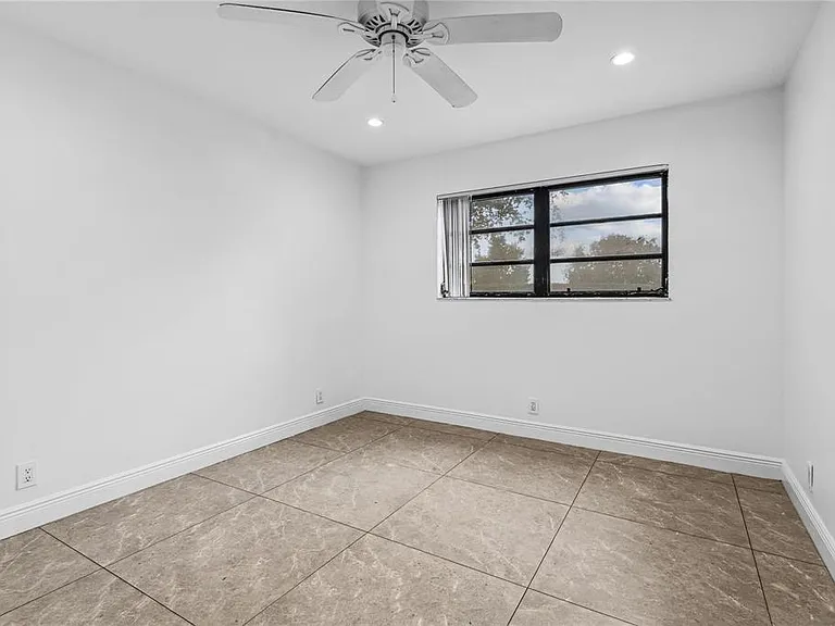 9150 NW 38th Dr #103 — Photo 7