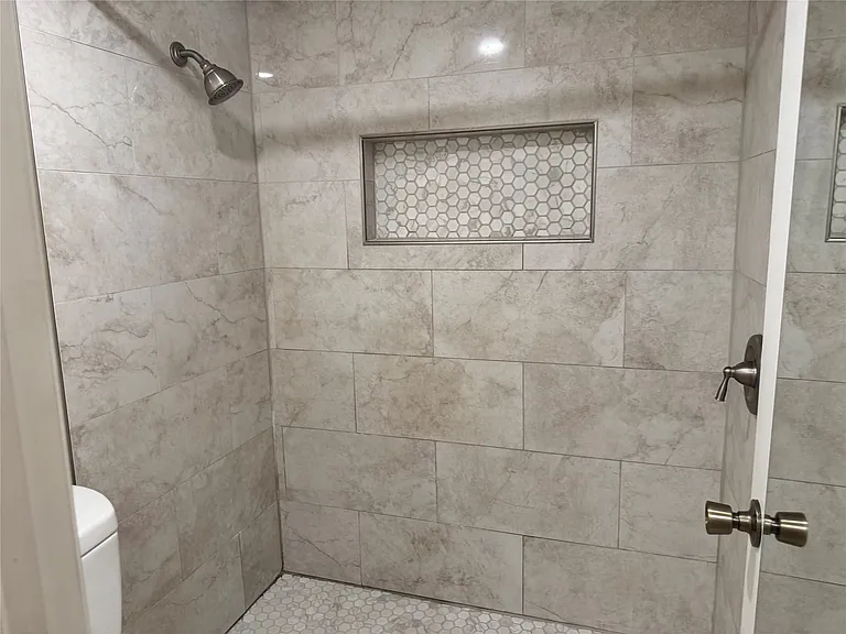 Primary bath has walk in shower