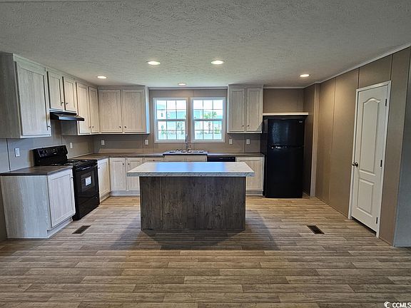 4th image of 3485 Peachtree Ln. #Garden Lakes Village