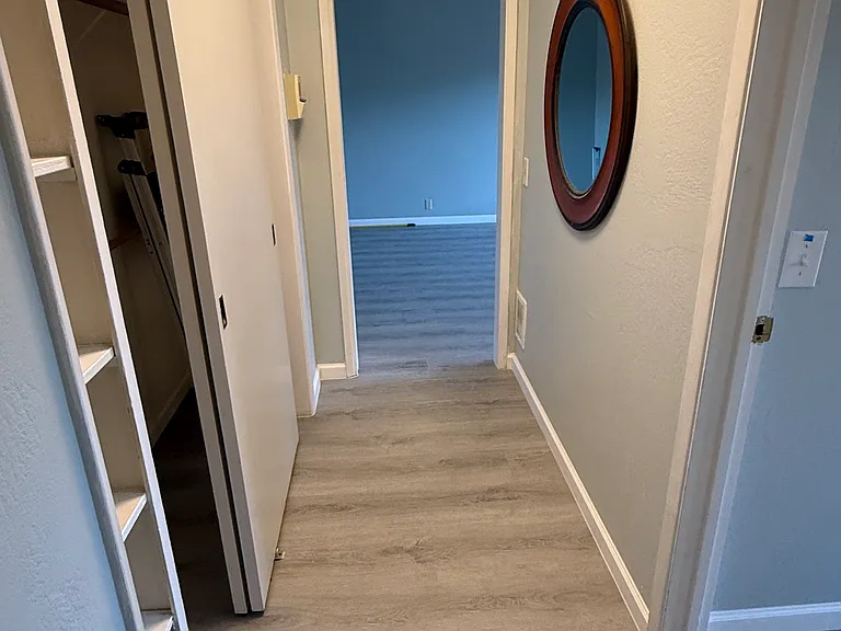 Hall way to Bedroom and Bathroom with Closet