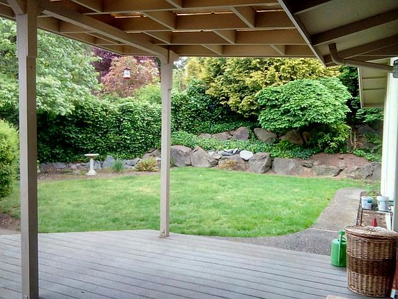 Covered deck for outdoor entertaining and fully fenced yard