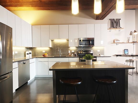 Open Concept Layouts with Industrial-Chic Style