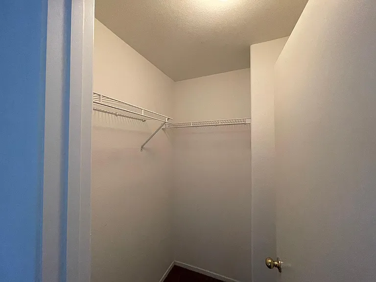 Walk in closet in 3rd bedroom
