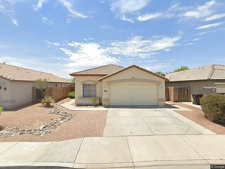 12379 W Woodland Ave