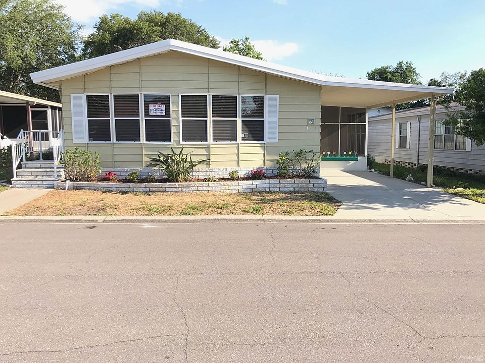 Front of home faces pond
