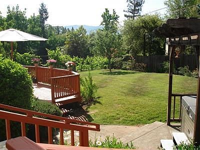 Master bedroom deck view of backyard and spa