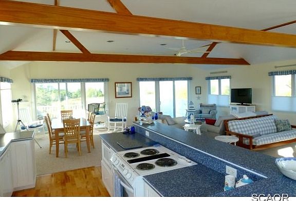 Kitchen Island Opens to Living